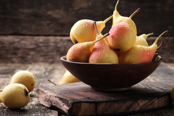 ripe pears on vitage wooden table - Photo, image