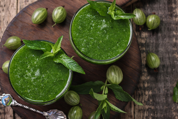 Healthy green fresh fruit and vegetable juice smoothie breackfast - Фото, изображение