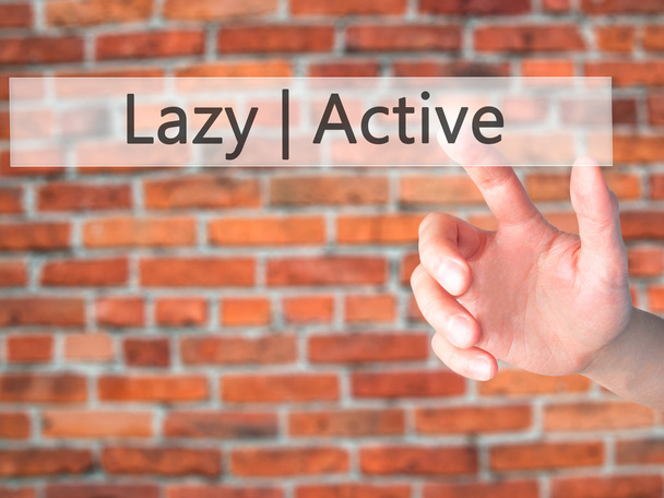 Active Lazy - Рука, яка натискає кнопку на розмитому фоні
 - Фото, зображення