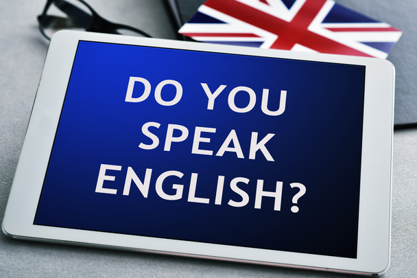 question do you speak English? in a tablet computer - Foto, Imagen
