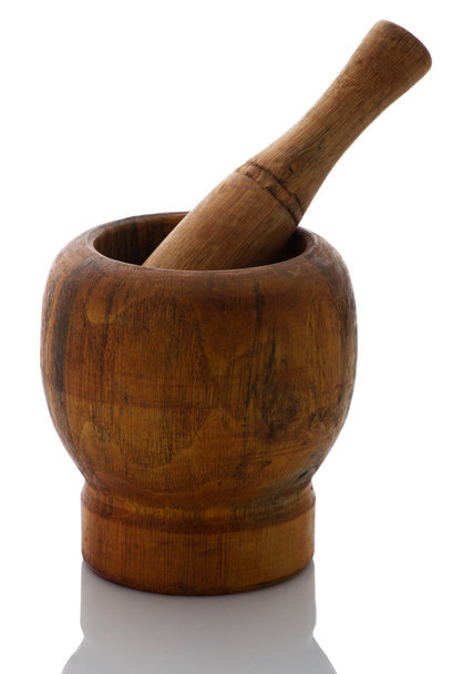 Wooden mortar and pestle on a white background - Photo, Image