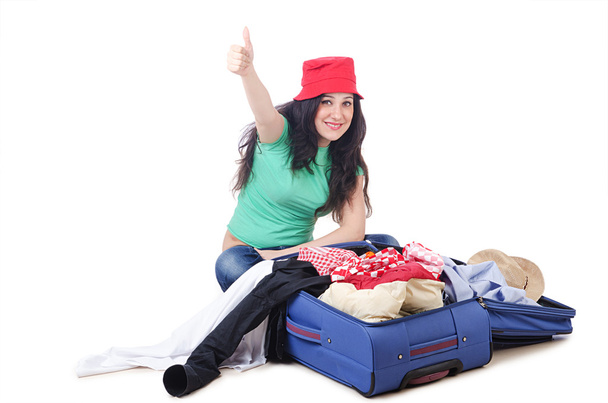 Girl packing for travel vacation - Φωτογραφία, εικόνα