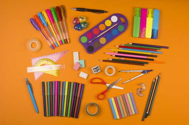 school supplies on orange background - Photo, Image