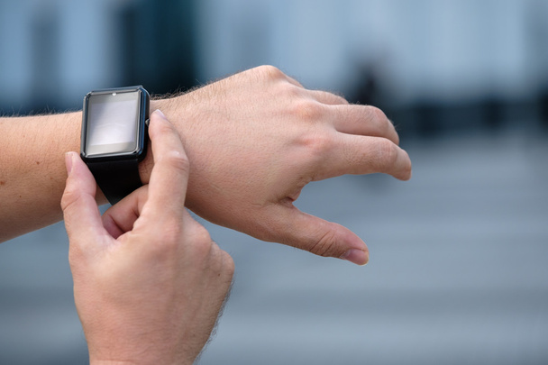 Man using smart watch - Photo, Image