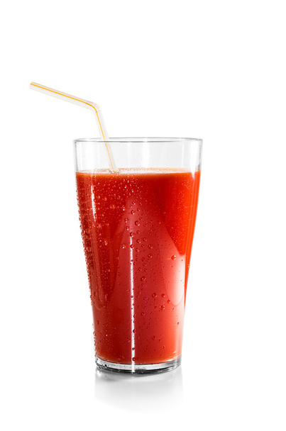 Glass of tomato juice and a straw isolated - Valokuva, kuva