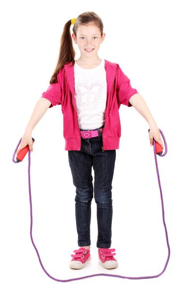 Beautiful little girl in sport clothes with skipping rope isolated on white - Photo, image