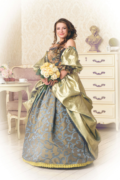 Pretty woman in luxury vintage dress - Foto, imagen