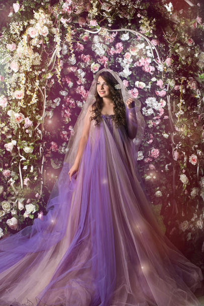 woman standing in violet long dress - Foto, immagini