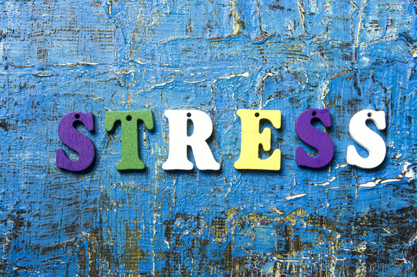 STRESS word written on abc letter at abstract grunge background. - Фото, зображення