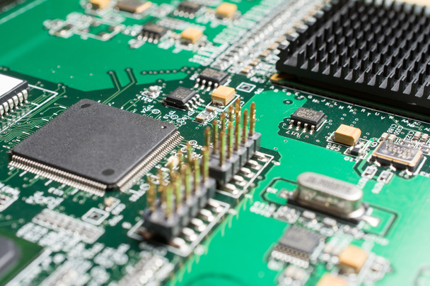 Detail of an electronic printed circuit board - Foto, afbeelding