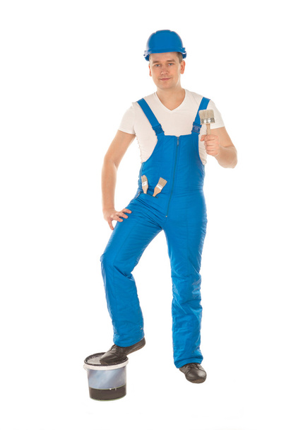 full length of builder in blue uniform - Photo, Image