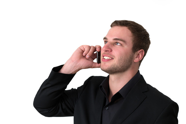 Young Man in jacket talking on the phone - Φωτογραφία, εικόνα