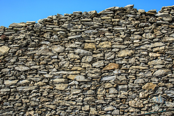 Grijze stenen muur - Foto, afbeelding