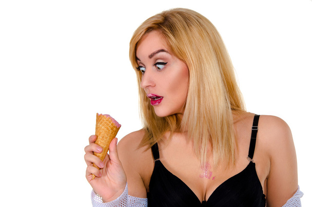 surprised young blonde with ice cream - Φωτογραφία, εικόνα
