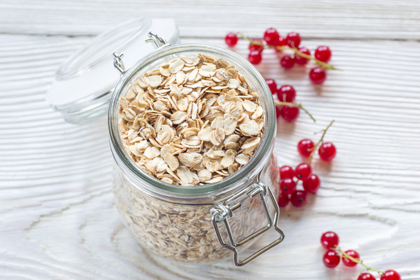 Red currant and oat flake in mason jar - Photo, Image