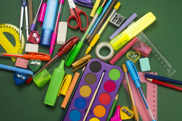 school supplies on green background - Photo, Image