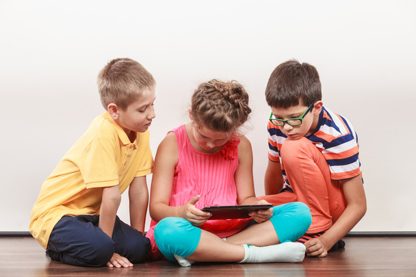 Kids playing on tablet. - Fotoğraf, Görsel