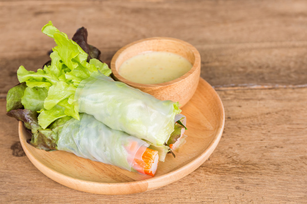 Vegetable salad in wooden plate. - Fotoğraf, Görsel