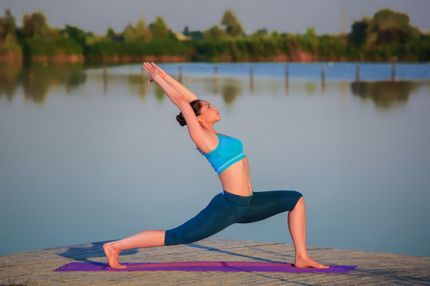 girl doing yoga exercise - Photo, Image