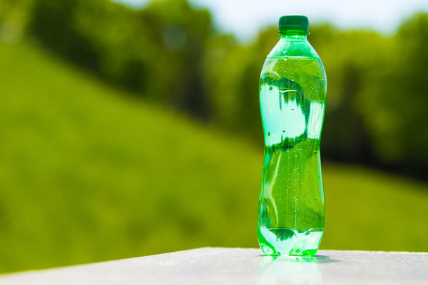 water in the green bottle - Photo, Image