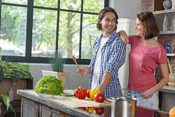 Young married couple preparing healthy food - Photo, Image