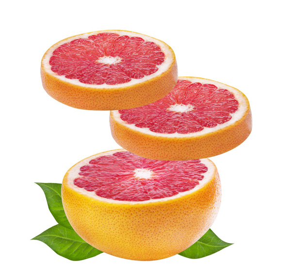 Grapefruit with slices isolated on white  - Photo, Image
