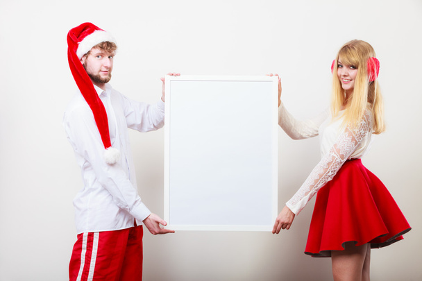 Couple woman and man with blank banner. Copy space - Foto, Imagen
