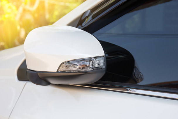 modern white car side view mirror folded with turn signal - Foto, afbeelding