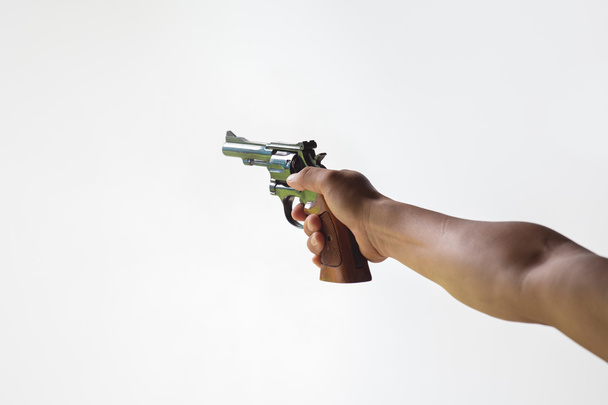 doel revolver handpistool geïsoleerd op witte achtergrond - Foto, afbeelding