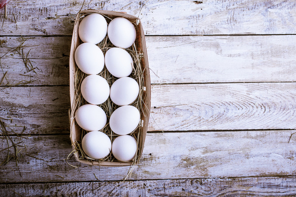chicken eggs with a box - Foto, Imagen