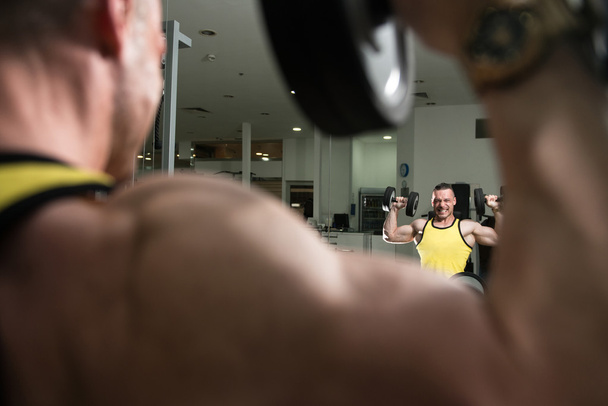 Shoulders Exercise In A Gym - Photo, Image