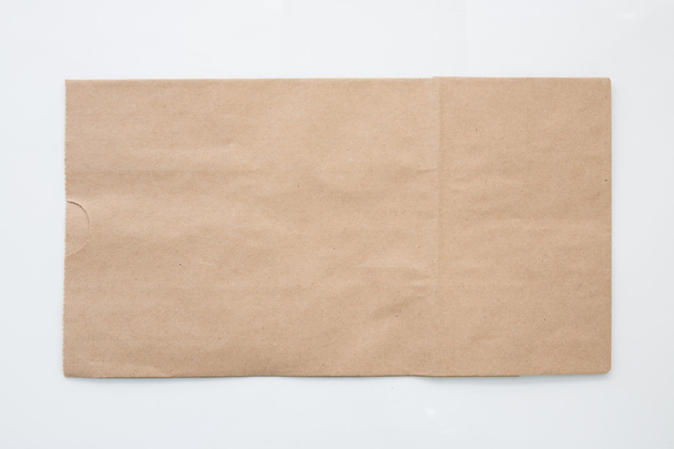 brown paper bag isolated on white background - Foto, imagen