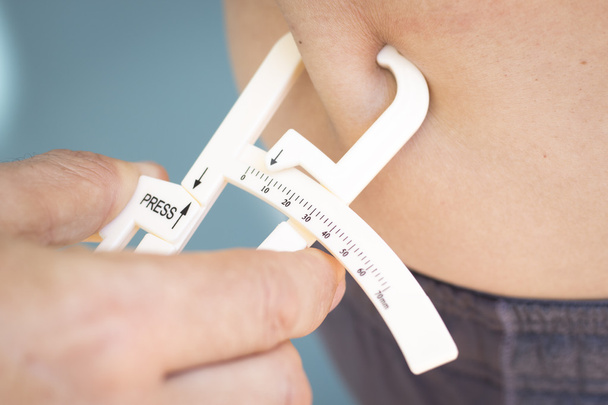 Vet remklauw meten van lichaamsvet - Foto, afbeelding