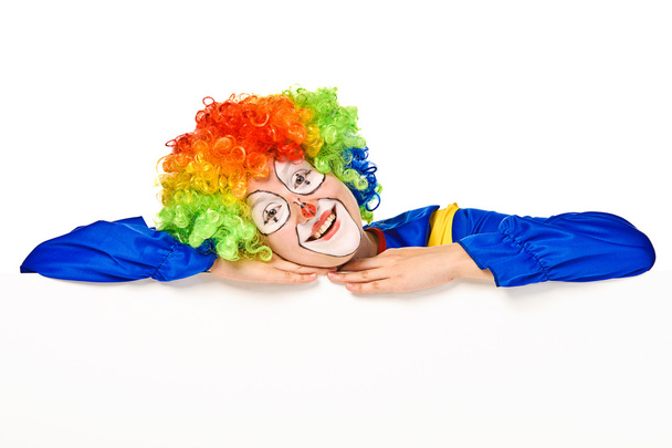 Funny clown standing over a white background - Photo, Image