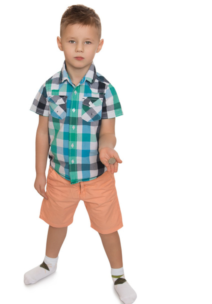 Boy holding a coin - Φωτογραφία, εικόνα