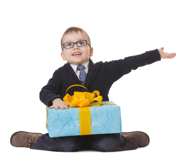 Small boy in spectecles with big present - Photo, Image