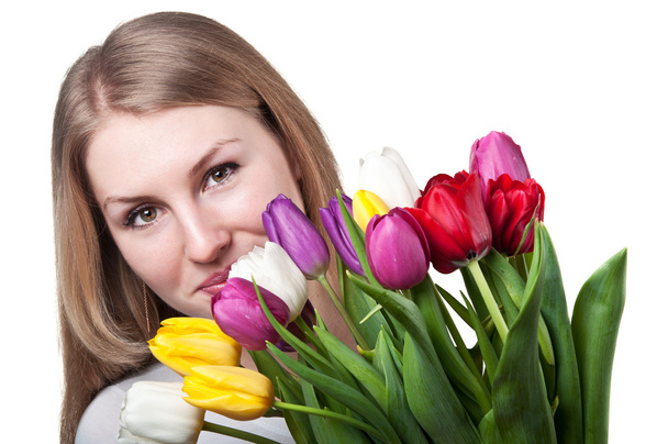 Beauty woman with tulips - Foto, imagen