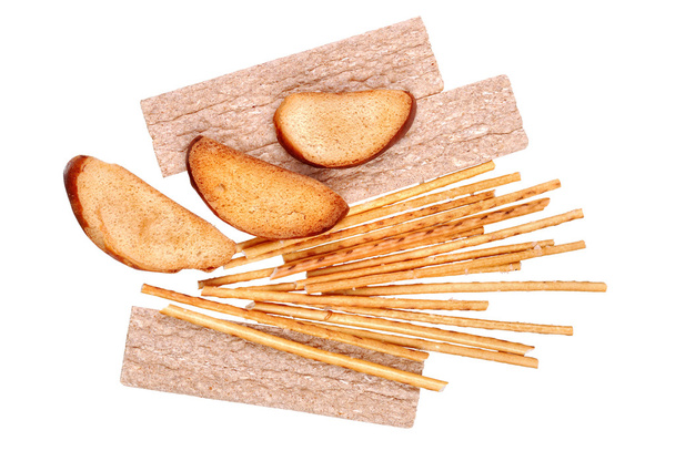 Beschuit en gezouten breadsticks geïsoleerd - Foto, afbeelding