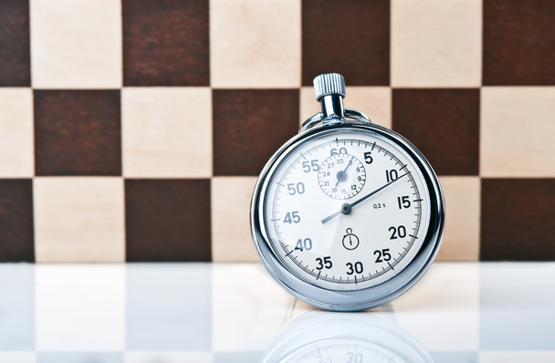 Stopwatch and chessboard - Photo, Image