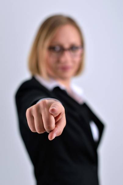 Successful businesswoman poses and hand pointing aim - Photo, Image