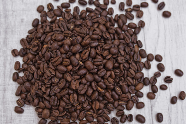 Coffee beans on the wooden background - Zdjęcie, obraz