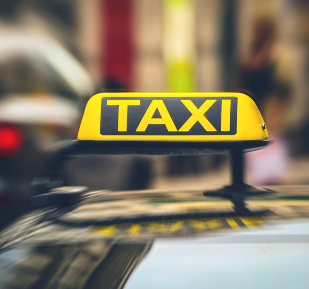 Taxi sign on car in motion blur - Photo, Image