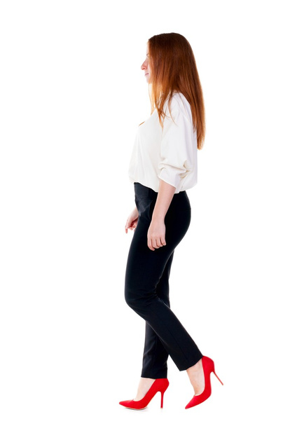 walking redhead business woman. - Valokuva, kuva