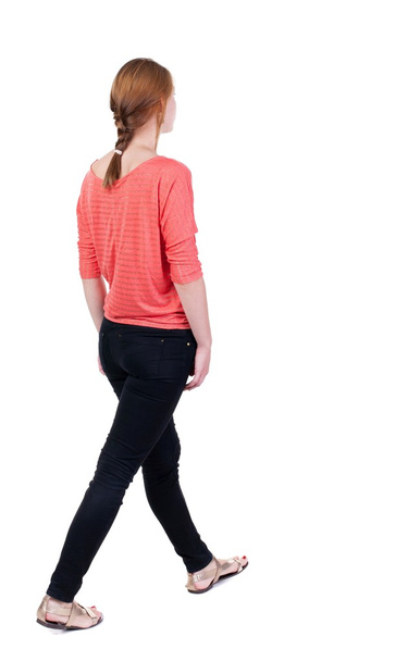 back view of walking  woman in jeans. beautiful blonde girl in m - Foto, afbeelding