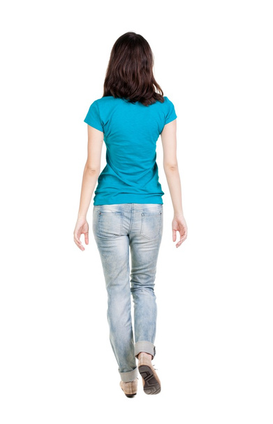 back view of walking  woman in jeans . - Foto, Imagen