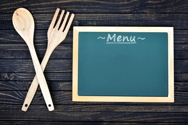 Kitchen utensils and menu  on table - Φωτογραφία, εικόνα
