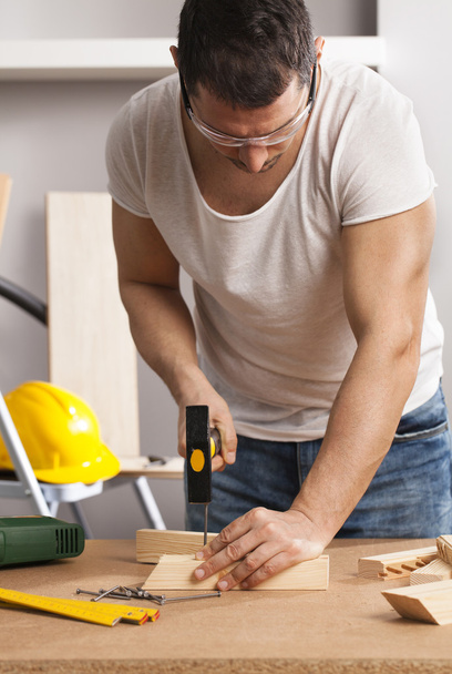 Carpenter working on a project - Photo, image