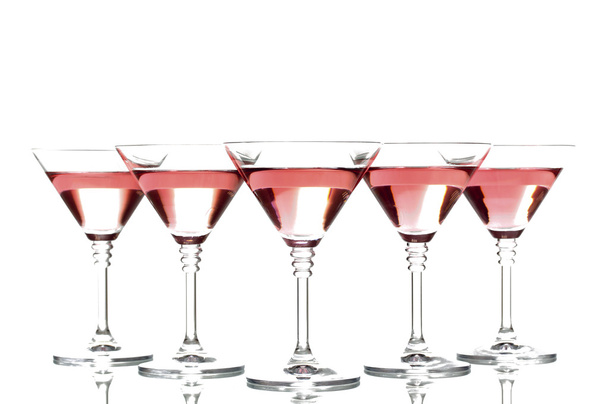 Red cocktail in martini glasses isolated on white - Foto, Imagem