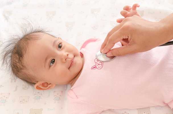 Close up Asian baby health check with stethoscope - Valokuva, kuva