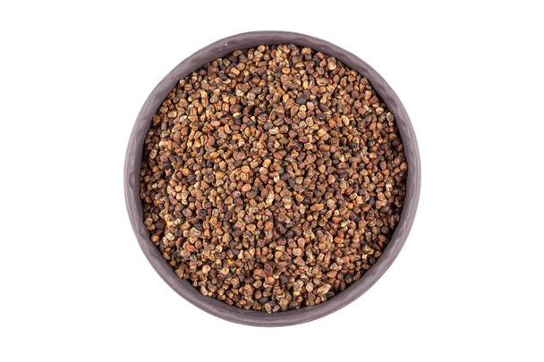 Decorticated cardamom seeds in a bowl - Фото, изображение